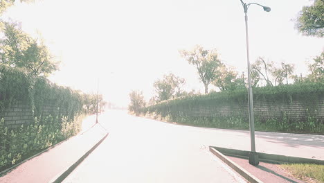city street with empty road and morning light in europe