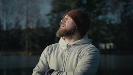 caucasian man taking a breath in winter.