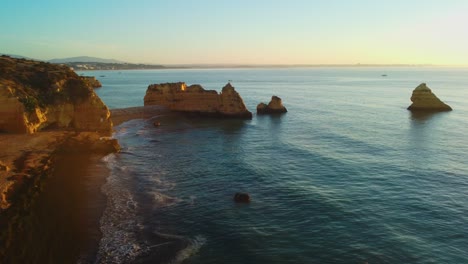 golden hour aerial view of praia dona ana beaches