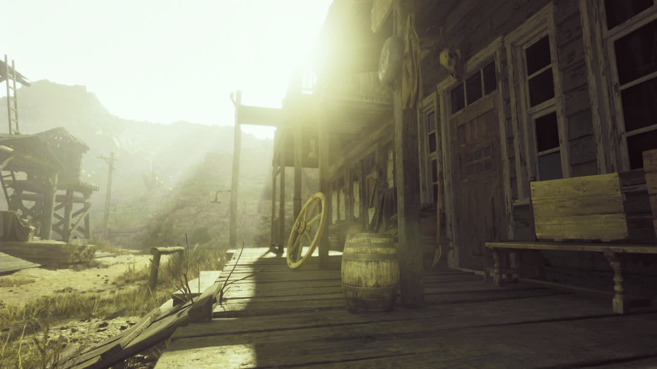 Historic wooden building in a ghost town with a sunlit desert landscape