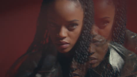 animated shot of multiple faces of a dark skinned girl posing.