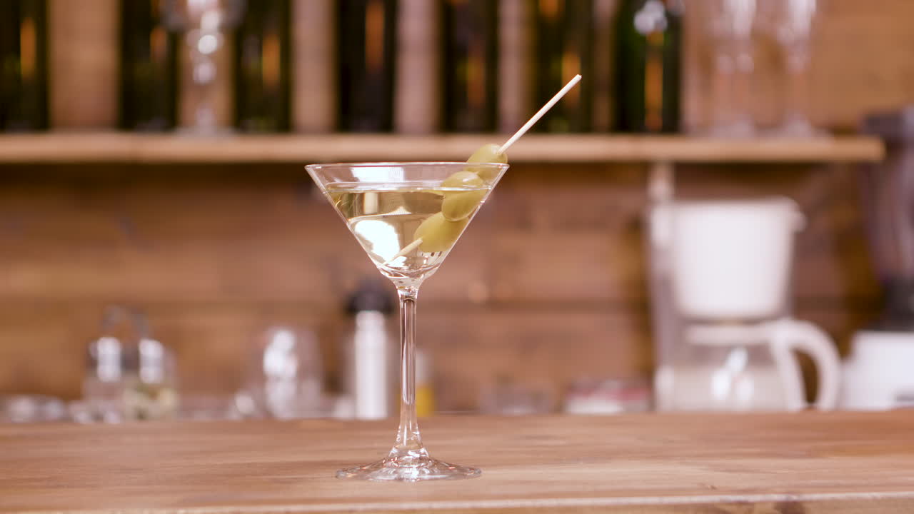 Martini with olives at the bar