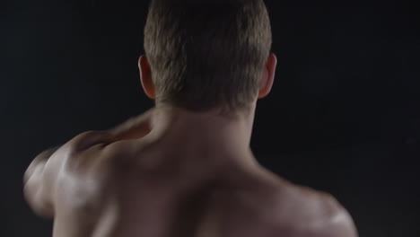 man preparing for a workout or fight