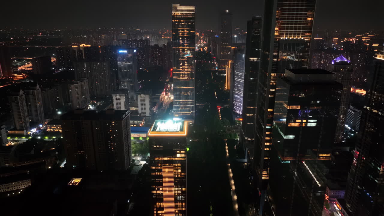 Panoramic Night View of a Bustling City Skyline