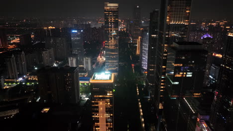 panoramic night view of a bustling city skyline