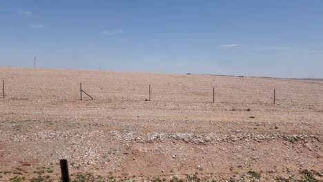 View-from-train-ride,-railway-of-Morocco,-arid-land-North-Africa