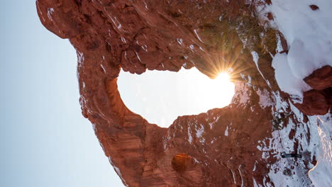 vertical 4k timelapse, arches national park utah usa, winter sunrise above natural arch