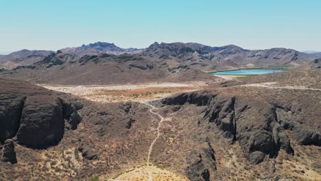 desert landscape with mountains in the distance, dry terrain in la paz, mexico