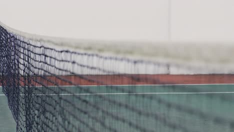 animation of envelope icon over net at tennis court