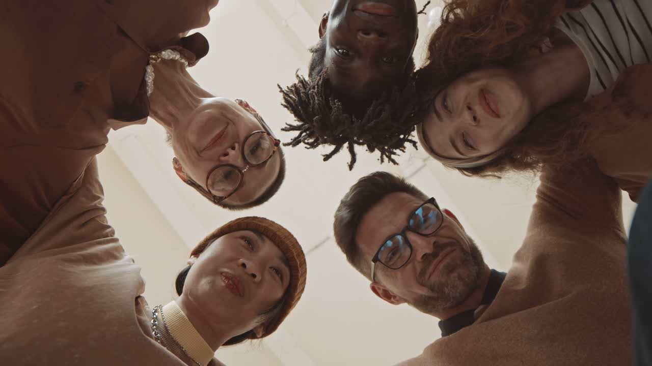 Diverse group of friends in a huddle