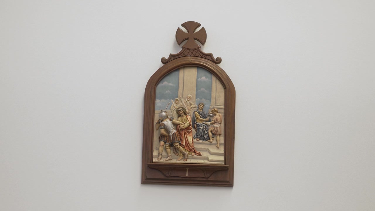 Stations of the Cross plaque depicting Jesus' condemnation by Pontius Pilate