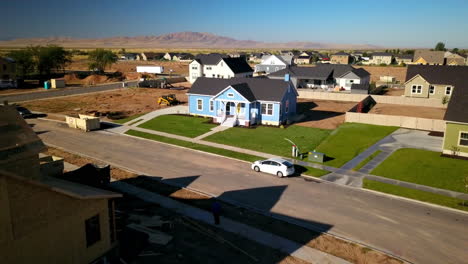 A-drone-slow-push-in-to-the-finishing-touches-on-a-brand-new-house-that-had-just-been-built-in-the-suburbs