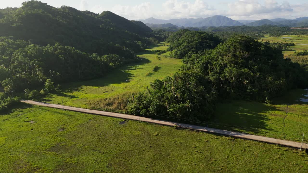 Aerial Drone View of Idyllic Valley and Lone Road in Antipolo, Virac, Catanduanes