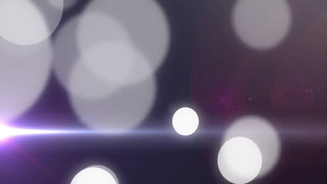 animación de puntos de luz brillantes que se mueven sobre un fondo negro