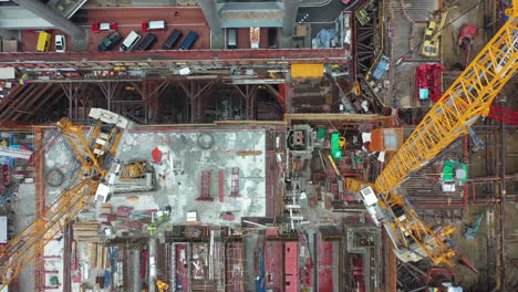 top view of a construction site with equipment and materials at daytime