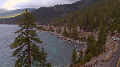 Aerial-of-road-and-hiking-pat-at-Lake-Tahoe-in-Nevada-on-a-pretty-winter-day