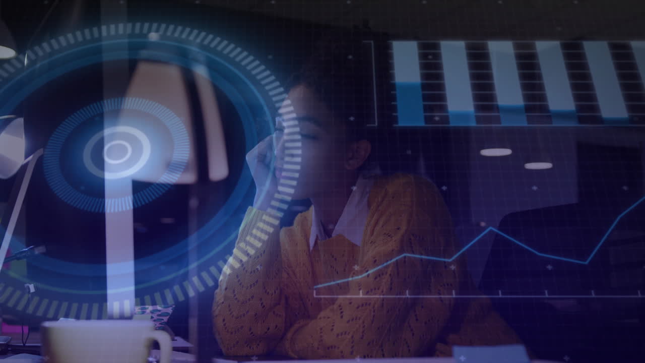 In office, businesswoman analyzing digital data charts with animation interface