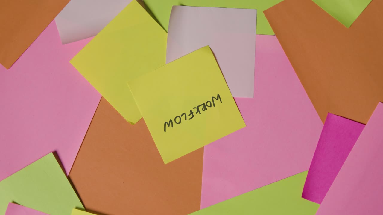 Business Concept Of Revolving Sticky Notes With Workflow Written On Top Note