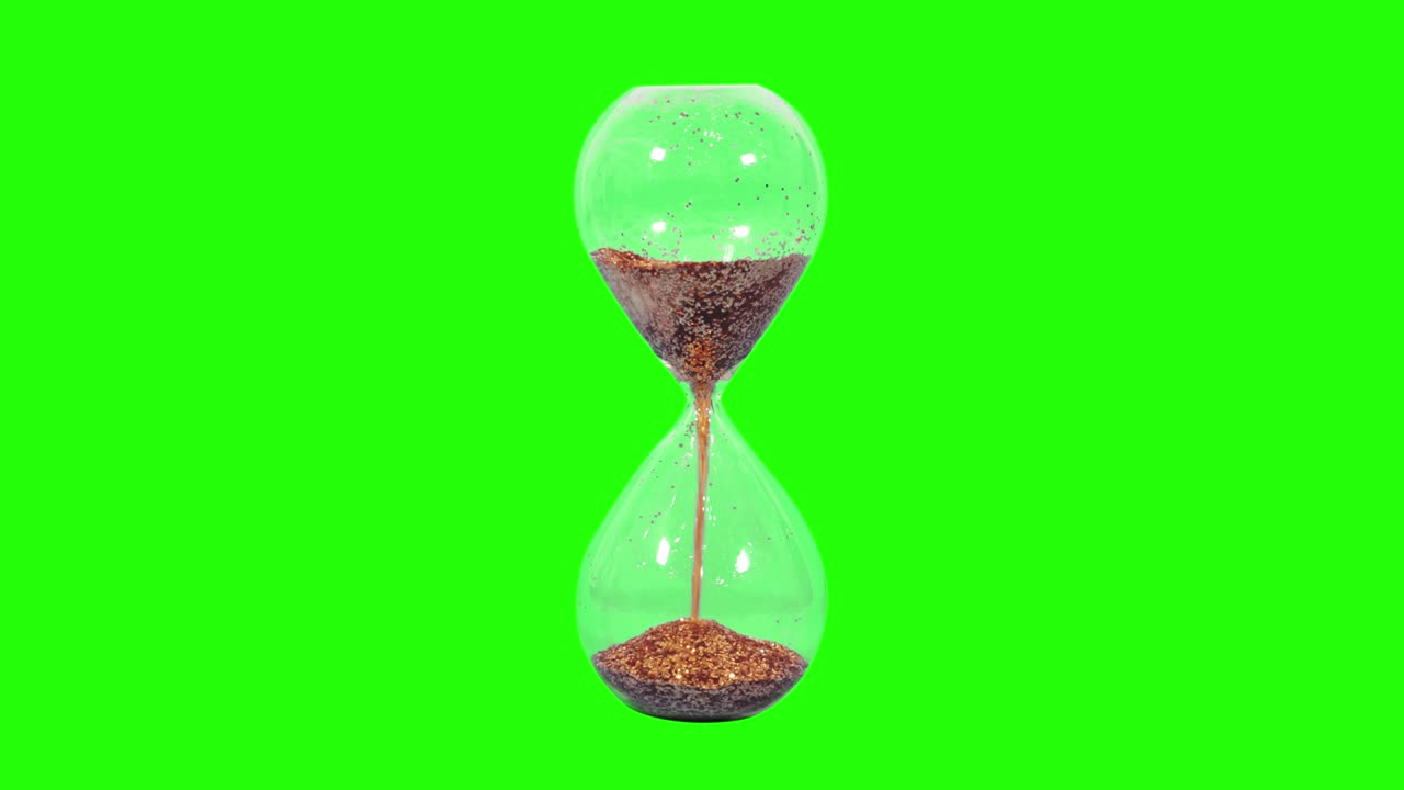 Golden hourglass on the light green screen
