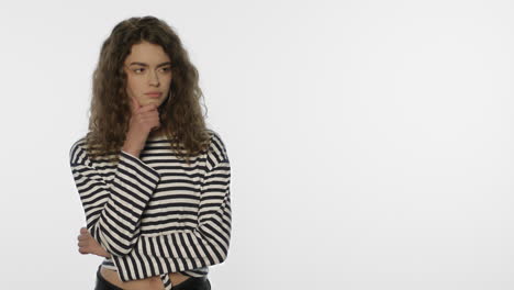 Thoughtful-woman-looking-at-white-background.-Pensive-girl-thinking-product