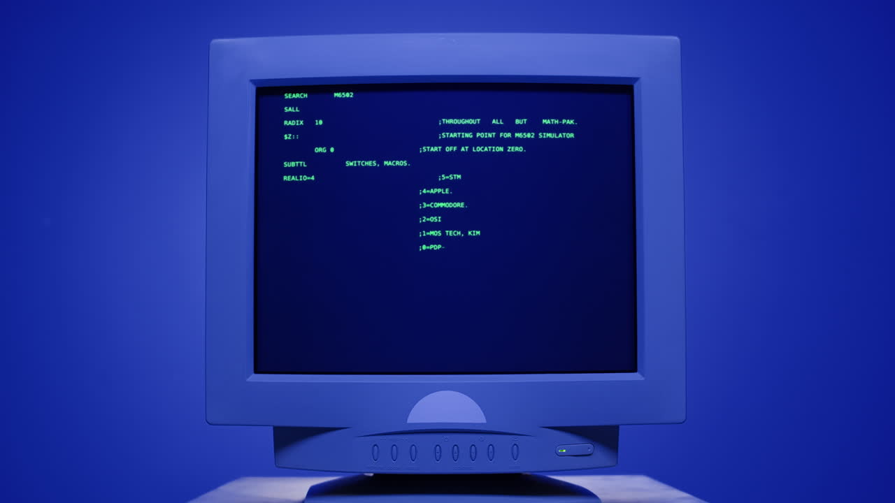 Vintage Computer Monitor Displaying Code