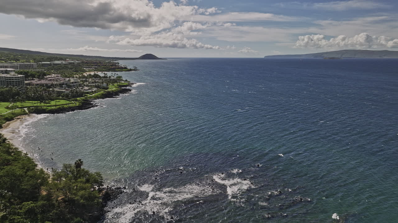 Wailea-Makena Maui Hawaii Aerial v13 panoramic view flyover Ulua beach capturing oceanfront resort hotels along the coastline, townscape and mountain landscape - Shot with Mavic 3 Cine - December 2022