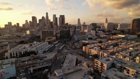 aerial pullout from los angeles skyline at sunset