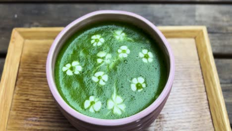 pink matcha bowl with flower latte art