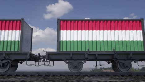 contenedores con la bandera de hungría. transporte ferroviario
