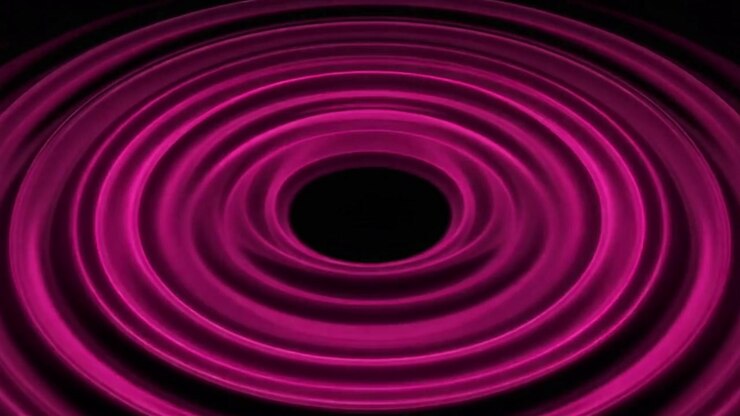 Ondulaciones rosas abstractas expandiéndose sobre fondo oscuro