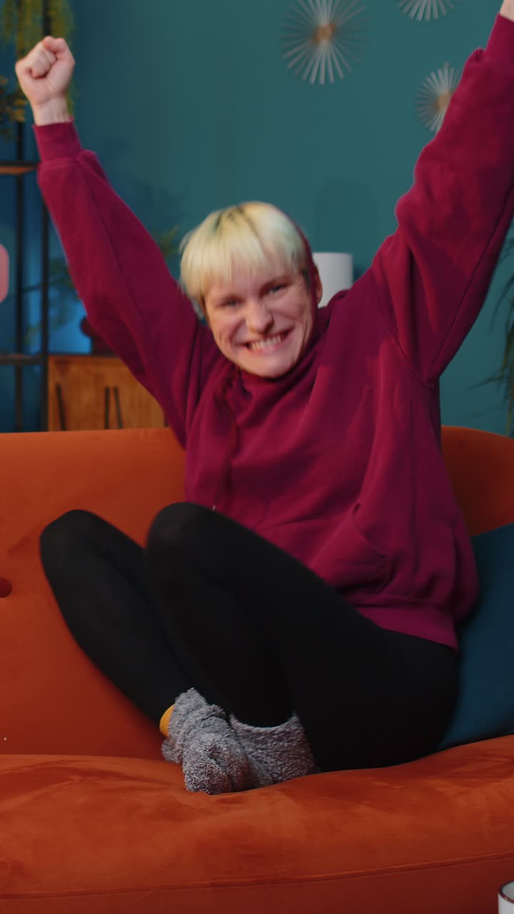 Excited happy woman surprised shocked by sudden victory good win news celebrating wow reaction
