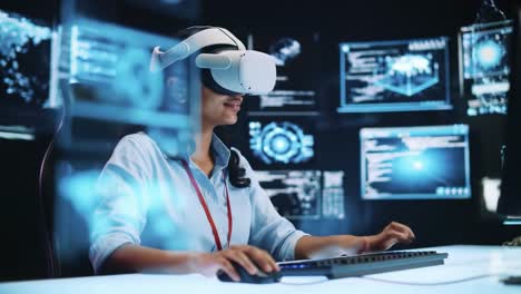 a woman engages with virtual reality technology, wearing a headset in a high-tech setting filled with screens. she navigates a simulation while using a keyboard, showcasing cutting-edge innovation.