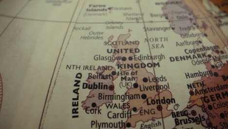 close-up of a world globe focusing on the united kingdom and ireland