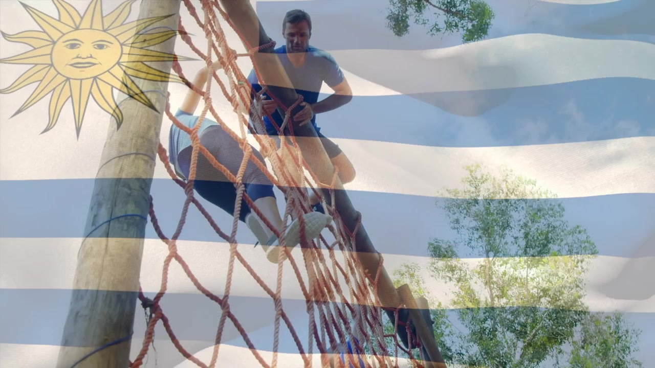 Animazione della bandiera dell'Argentina su donna e uomo di etnie diverse durante l'allenamento di corsa ad ostacoli
