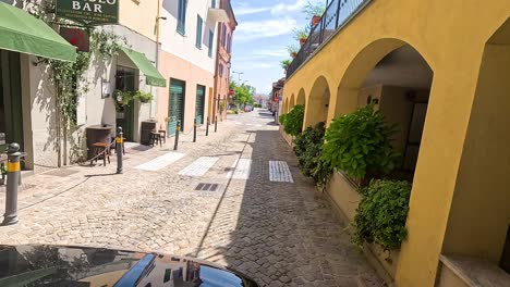 exploring cobblestone streets in piedmonte, italy