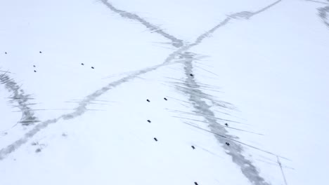 Drone-over-frozen-lake-sacandaga,-New-York