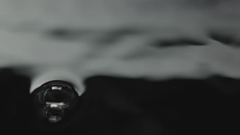 bubbles form in the water creating ripples