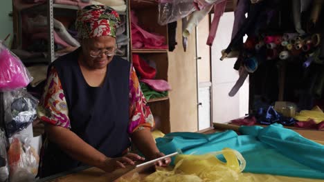 Mixed-race-woman-working-at-a-hat-factory