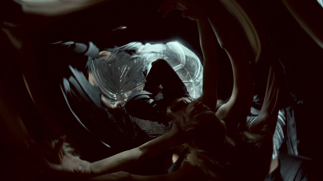 Female Dancer Performing Dramatically in Surreal Mirrored Space