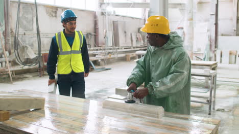 people working with marble