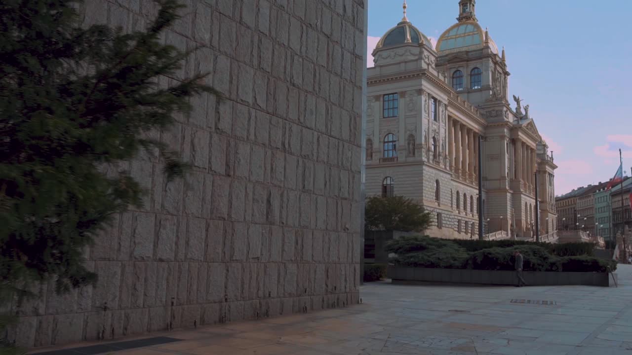 National Museum in Prague, Czech Republic, side reveal over trees, urban nature