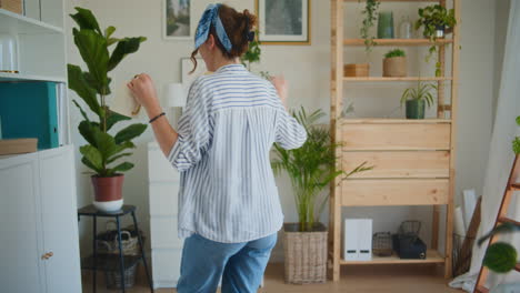 Woman-Dancing-with-Watering-Can