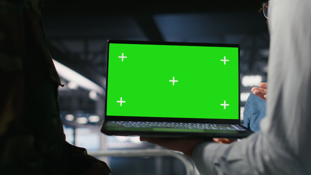 Army engineering team in command center server hub using mockup laptop