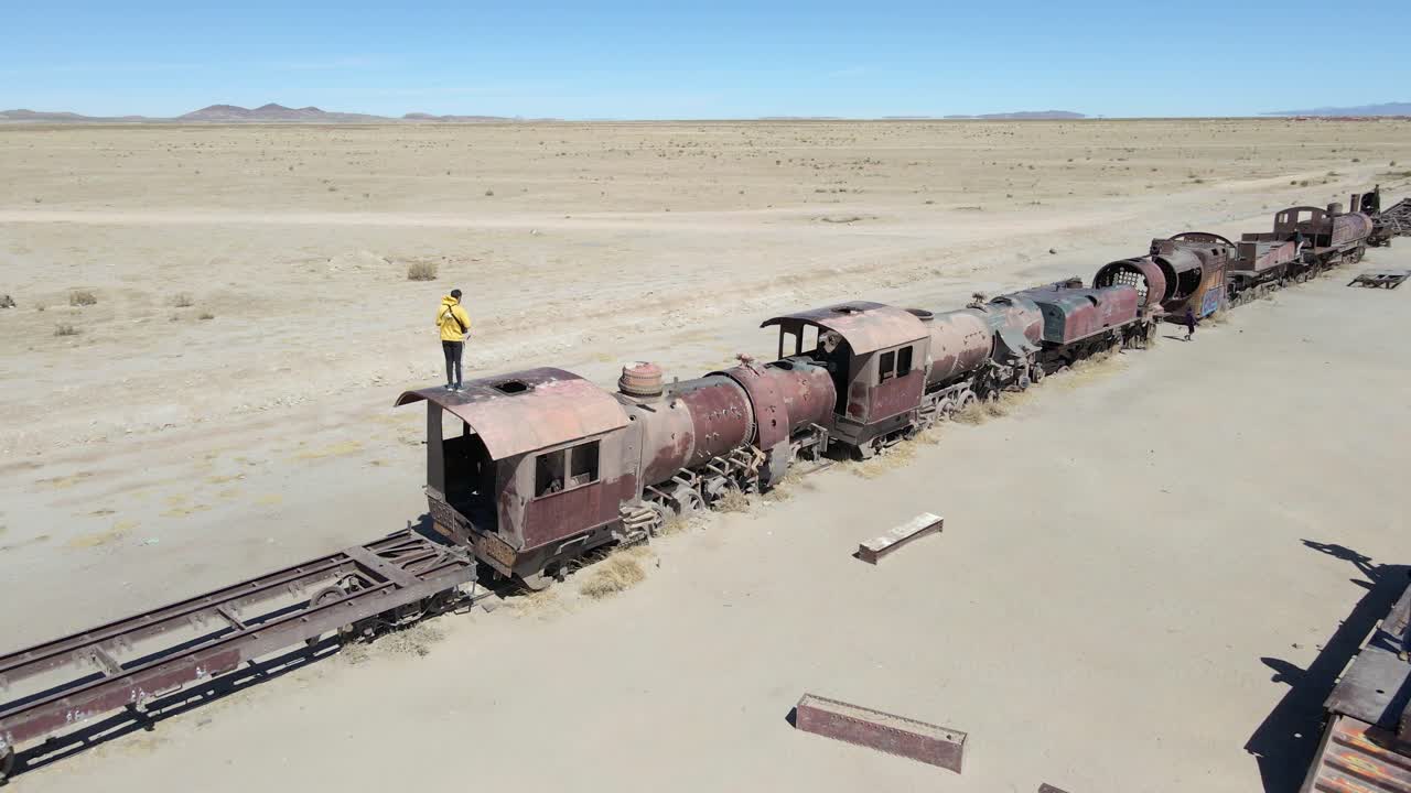 Uyuni desert Train cemetery Bolivia graveyard tourist attraction, aerial drone South America