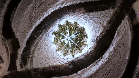 top down of christmas tree at night at nowa huta, krakow, poland