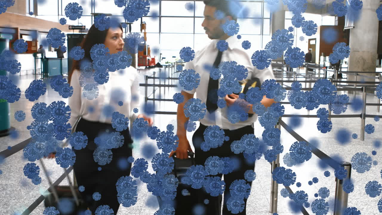 두 명의 백인 노동자 위에 떠다니는 거대 코로나19 세포의 애니메이션