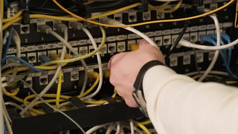 technician configures the network equipment in the server room