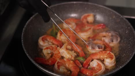 cooking shrimp in a pan