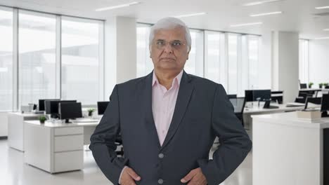 Indian-senior-Indian-businessman-smiling-looking-at-the-camera