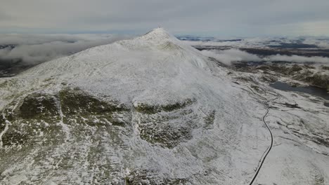 flying towards the top of mount gaustatopen, southern norway